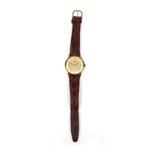 1049 - 9ct gold gentleman's Longines wristwatch with leather strap, 3.2cm in diameter excluding the crown