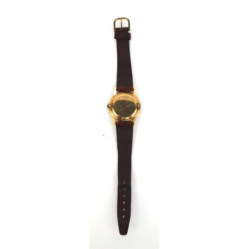 1049 - 9ct gold gentleman's Longines wristwatch with leather strap, 3.2cm in diameter excluding the crown