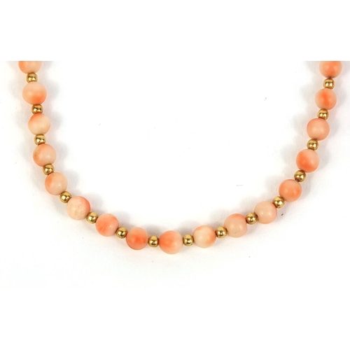 1005 - Two 9ct gold and coral necklaces and two pairs of gilt metal coral and turquoise earrings, approxima... 