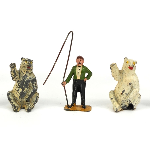 427 - Group of hand painted lead circus figures, animals and accessories, including bears, circus leader, ... 