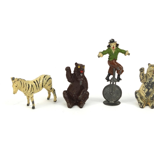 427 - Group of hand painted lead circus figures, animals and accessories, including bears, circus leader, ... 