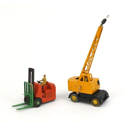 411 - Two die cast Dinky Toys with boxes, comprising Coles mobile crane 571 and Coventry Climax Forks Lift... 