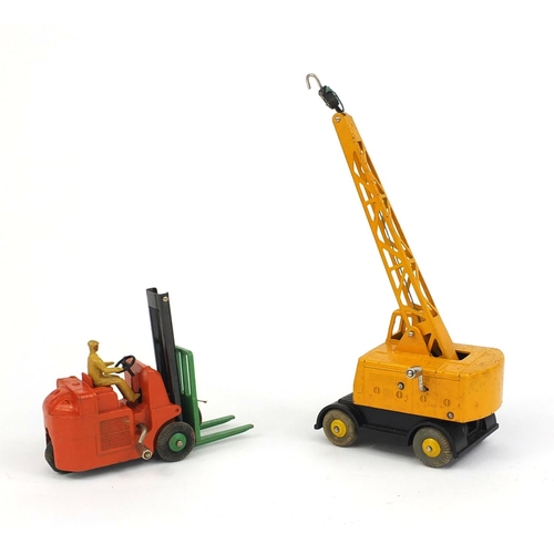 411 - Two die cast Dinky Toys with boxes, comprising Coles mobile crane 571 and Coventry Climax Forks Lift... 