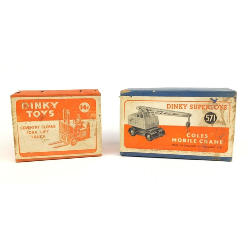 411 - Two die cast Dinky Toys with boxes, comprising Coles mobile crane 571 and Coventry Climax Forks Lift... 