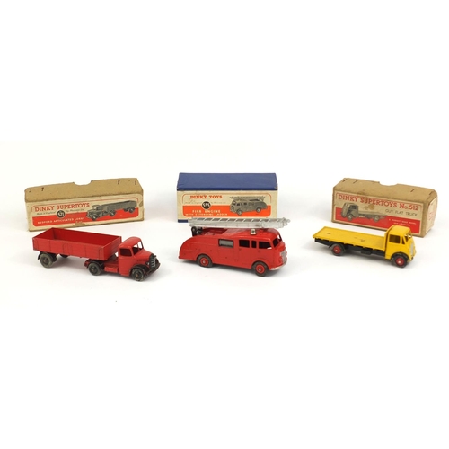 409 - Three die cast Dinky Toys with boxes, comprising fire engine with extending ladder 555, Guy flat tru... 