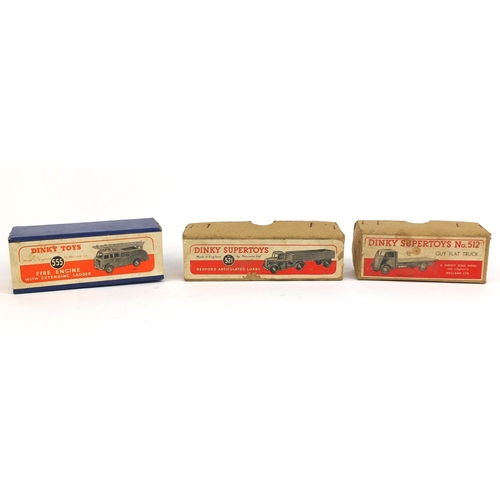 409 - Three die cast Dinky Toys with boxes, comprising fire engine with extending ladder 555, Guy flat tru... 