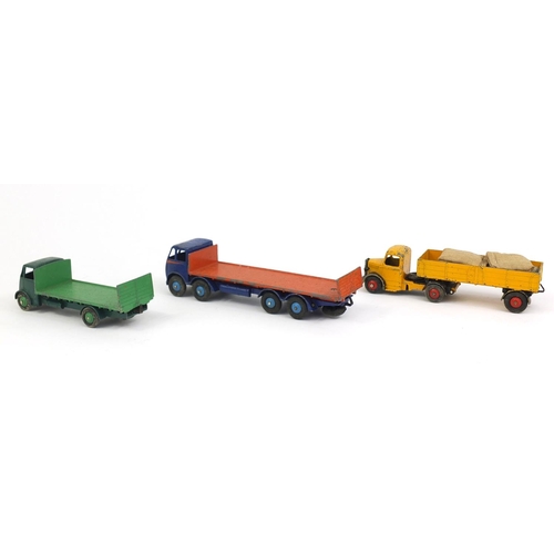 410 - Three Dinky Super Toys with boxes, comprising Guy flat truck 513, Bedford articulated lorry 521 and ... 