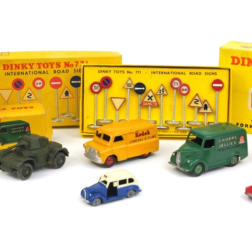 412 - Seven Dinky Toys die cast vehicles and International road signs 771 with boxes, the vehicles compris... 