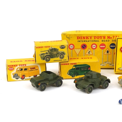 412 - Seven Dinky Toys die cast vehicles and International road signs 771 with boxes, the vehicles compris... 