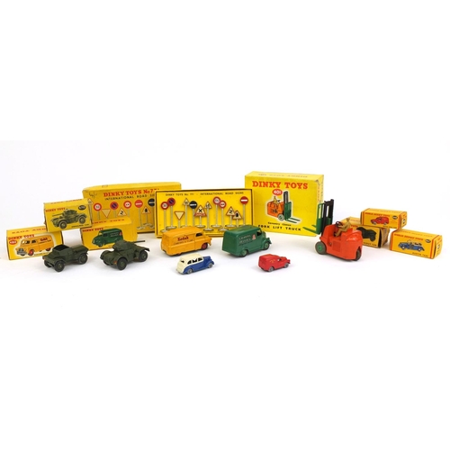 412 - Seven Dinky Toys die cast vehicles and International road signs 771 with boxes, the vehicles compris... 