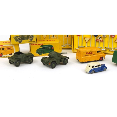 412 - Seven Dinky Toys die cast vehicles and International road signs 771 with boxes, the vehicles compris... 