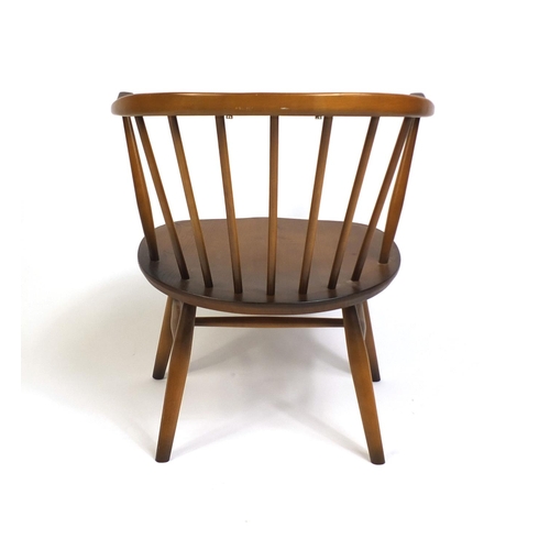 2048 - Ercol elm stick back tub chair with cushion backa nd seat pads, 67cm high