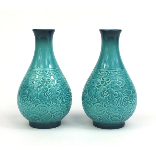 2087 - Pair of Beswick turquoise cathay vases with floral decoration, factory marks to the base of each and... 