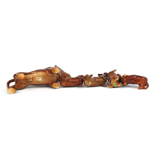 2078 - Five Beswick Dachshunds dogs, one with original paper label, each with factory marks to the base, th... 