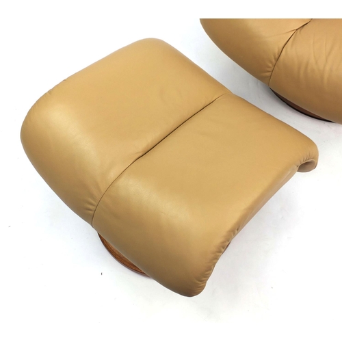 2001 - Stressless beige leather chair with foot stool, the chair 106cm high