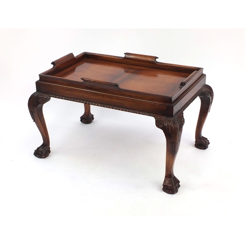 2006 - Carved mahogany butlers tray on stand table with ball and claw feet, 53cm high x 80cm wide x 58cm de... 