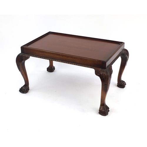 2006 - Carved mahogany butlers tray on stand table with ball and claw feet, 53cm high x 80cm wide x 58cm de... 