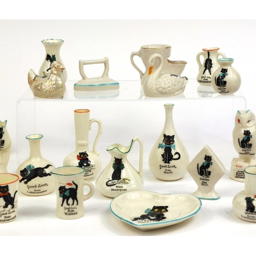 2098 - Group of black cat crested china including examples from Northwood, Herne Bay and Brighton, the larg... 