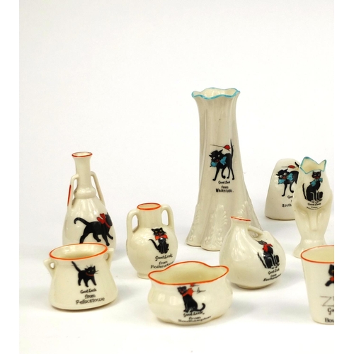 2098 - Group of black cat crested china including examples from Northwood, Herne Bay and Brighton, the larg... 