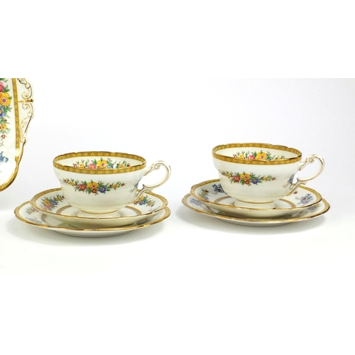 2230 - Group of Royal Paragon teaware each with floral decoration, comprising four trio's and a sandwich pl... 