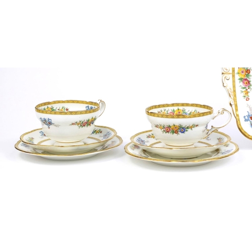 2230 - Group of Royal Paragon teaware each with floral decoration, comprising four trio's and a sandwich pl... 