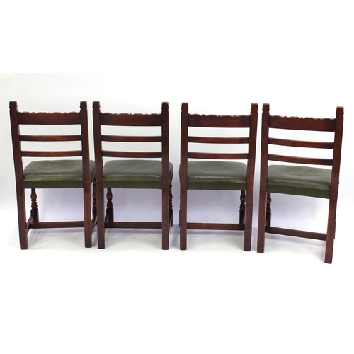 2018 - Set of six carved oak dining chairs including two carvers, each with green leather upholstered seats... 