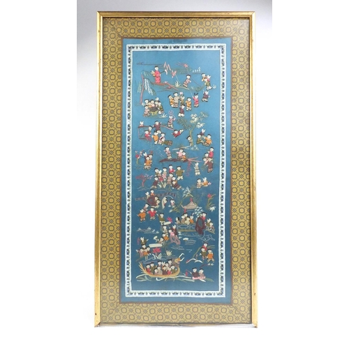 264 - Oriental tapestry silk panel of one hundred children, 66cm x 32cm excluding the frame