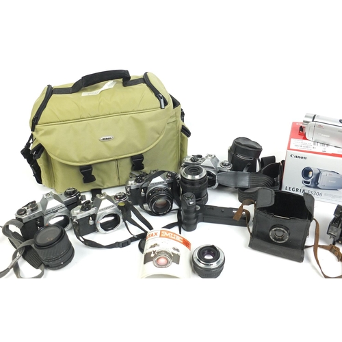 233 - Collection of Pentax cameras and lenses, two digital camcorders and a Canon photo printer