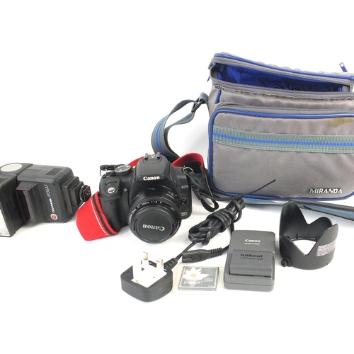 207 - Canon EOS digital camera and a Minolta 5000 camera with flash unit