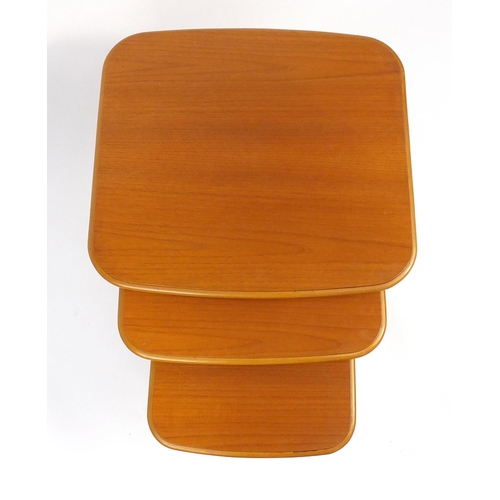 33 - Nest of three teak occasional tables, the larger 46cm high