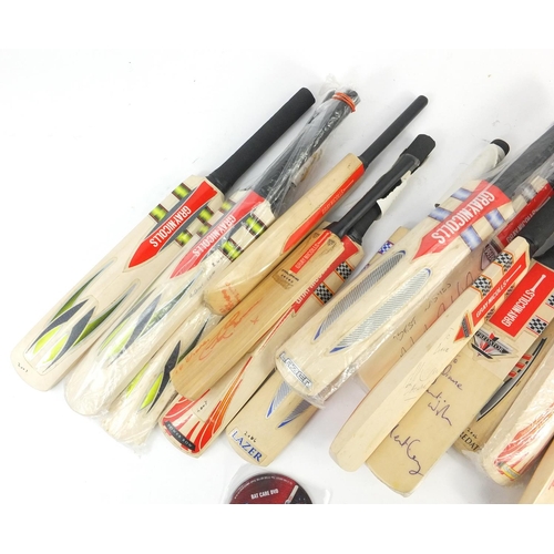 397 - Collection of miniature autographed cricket bats