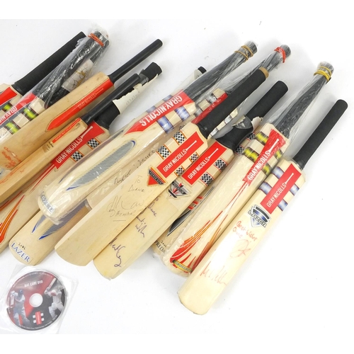 397 - Collection of miniature autographed cricket bats