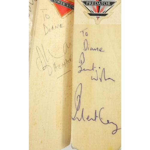 397 - Collection of miniature autographed cricket bats