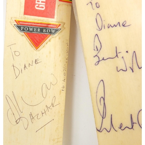 397 - Collection of miniature autographed cricket bats