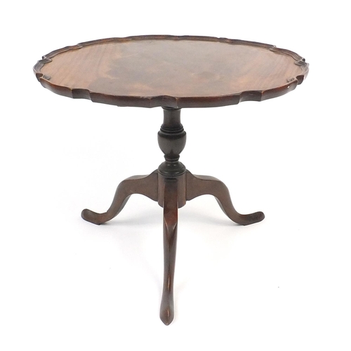 26 - Mahogany tilt top table with shaped scalloped top, 50cm high x 60cm in diameter
