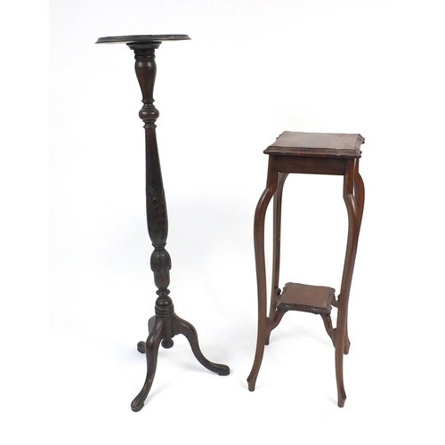 52 - Carved mahogany torchiere with circular top and a mahogany two tier plant stand, the torchiere 122cm... 