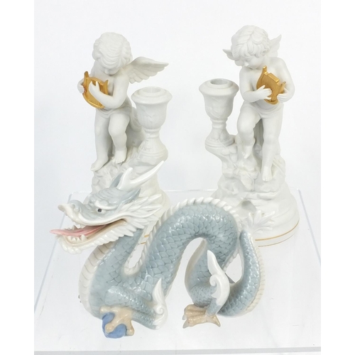 198 - Collectable china including a pair of Franklin Mint cherub candle sticks, set of six Wedgwood Aginco... 