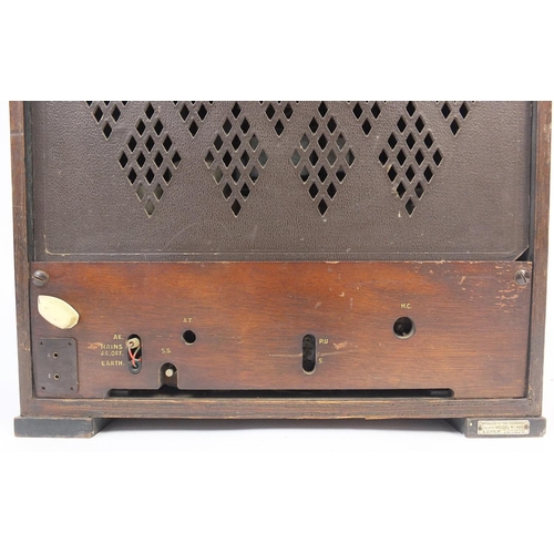 24 - Art Deco His Masters Voice walnut cased radio with Bakelite dials, 40cm high
