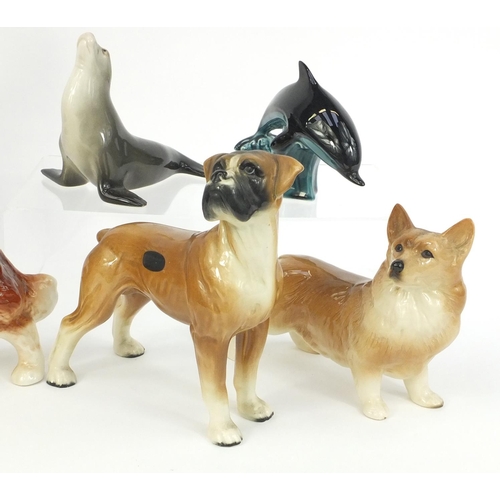 271 - Collection of china animals including a Coopercraft Boxer dog, Russian USSR Sealion, Poole dolphin, ... 