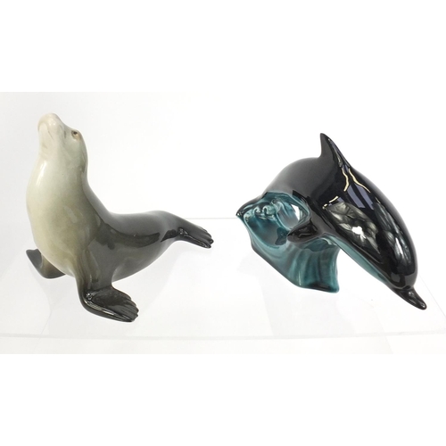 271 - Collection of china animals including a Coopercraft Boxer dog, Russian USSR Sealion, Poole dolphin, ... 