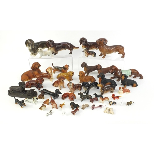 263 - Collection of china, resin and glass Dachshunds, the largest 25cm long