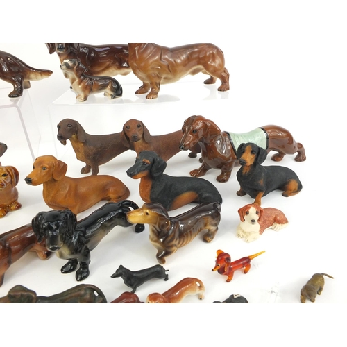 263 - Collection of china, resin and glass Dachshunds, the largest 25cm long