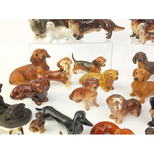 263 - Collection of china, resin and glass Dachshunds, the largest 25cm long