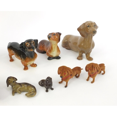 186 - Collection of china Dachshunds including a pair of Jema examples and a Szeiler together with a pair ... 