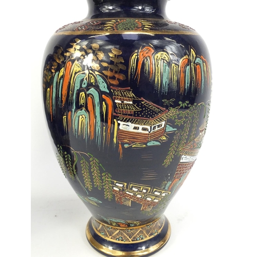 122 - Pair of Carlton Ware design Lustre vases decorated with pagodas, 30.5cm high