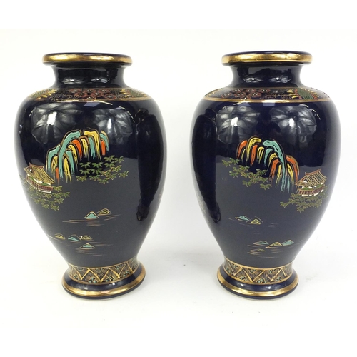 122 - Pair of Carlton Ware design Lustre vases decorated with pagodas, 30.5cm high