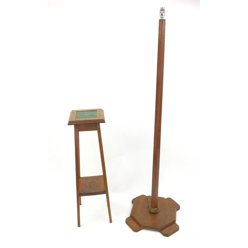 27 - Arts & Crafts oak plant stand with tile top and an Art Deco oak standard lamp, 162cm high