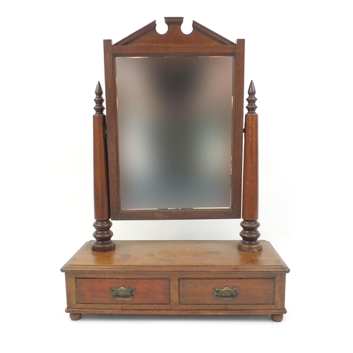 23 - Edwardian mahogany toilet mirror with bevelled glass, fitted with two drawers, 84cm high x 62cm wide... 