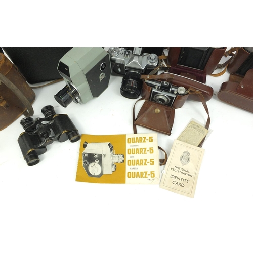 217 - Selection of vintage cameras including Kodak examples and a pair of Military interest Lemaire binocu... 