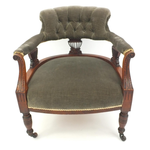 12 - Carved walnut bedroom chair with green button back upholstery and scroll arms